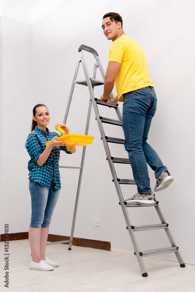 Wife and husband family doing home improvements Wife and husband family doing home improvements