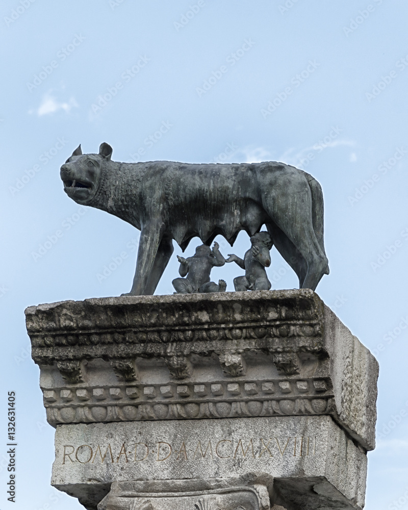 Column with capitoline Wolf statue, legend of Rome