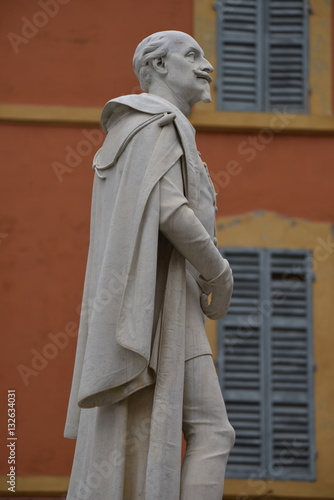Statue of Poet Alessandro Tassoni, Piazza Torre in Modena, Italy photo