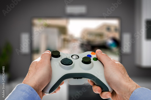 Gaming game play video on tv or monitor. Gamer concept. photo