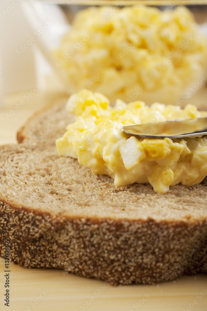 Spreading Egg Mayonnaise on Bread Spreading Egg Mayonnaise on Bread