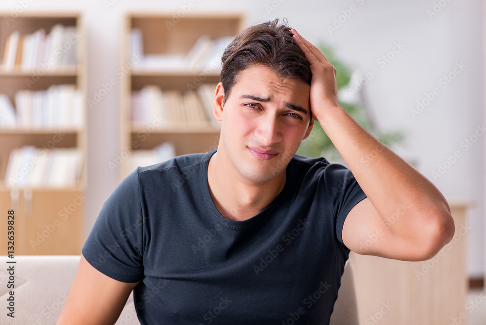 Young handsome man suffering from pain Young handsome man suffering from pain