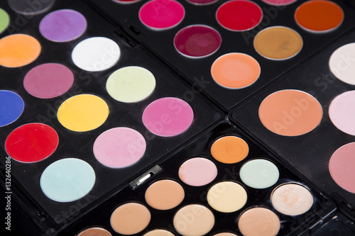 colorful eyeshadow palette and blush for make-up closeup