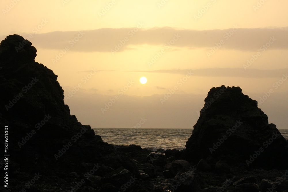 Sea and Rocks at Sunset