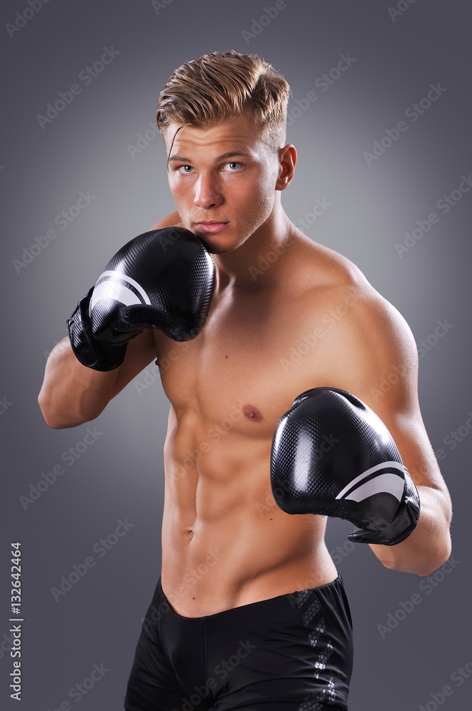 Portrait of Handsome Muscular Fighter Practicing. Concept of Healthy Lifestyle.