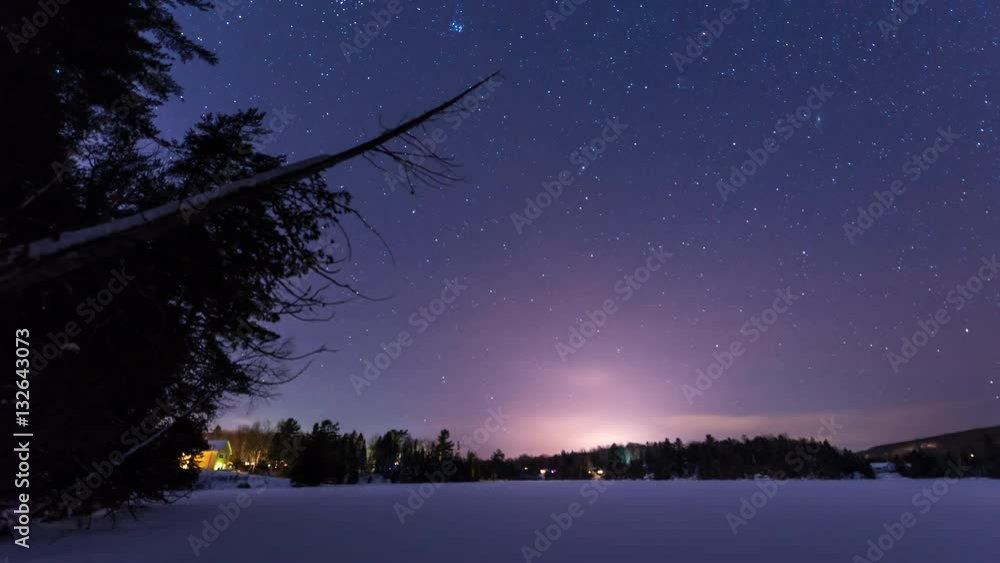 Time lapse of stars over frozen lake Time lapse of stars over frozen lake