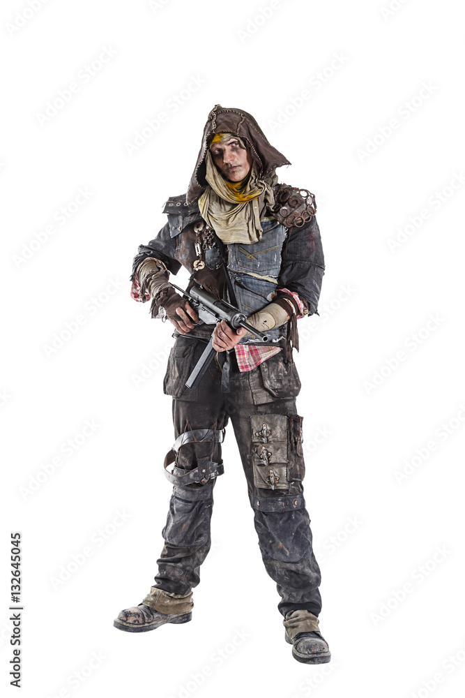 Nuclear post apocalypse life after doomsday concept. Grimy survivor with homemade weapons. Studio closeup portrait on white background Nuclear post apocalypse life after doomsday concept. Grimy survivor with homemade weapons. Studio closeup portrait on white background