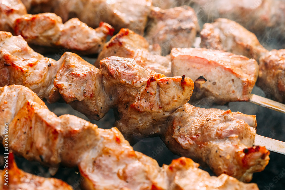 Grilled Barbecue Meat Shashlik Shish Kebab Pork Meat Grilling On Metal Skewer.