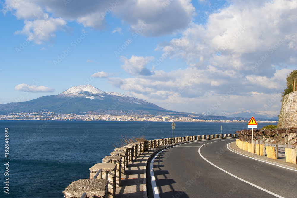 Typical road Sorrento peninsula, with volcano Vesuvius on backgr