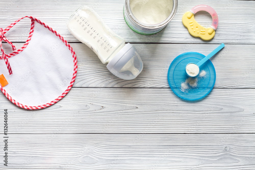 preparation of mixture baby feeding on wooden background top view preparation of mixture baby feeding on wooden background top view