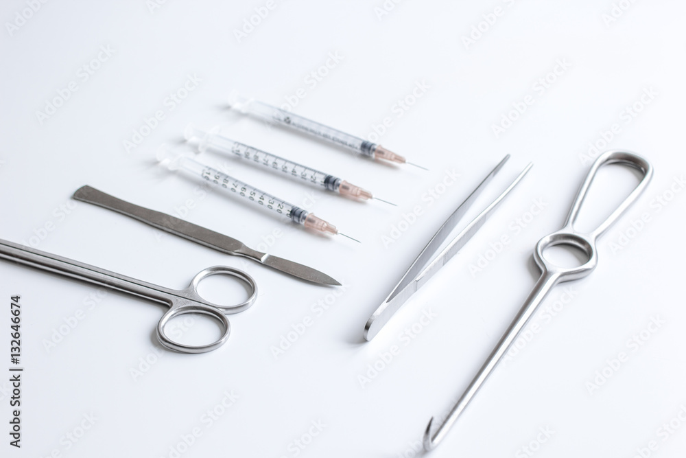 instruments for plastic surgery on white background instruments for plastic surgery on white background
