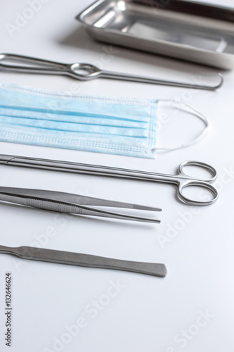 instruments for plastic surgery on white background