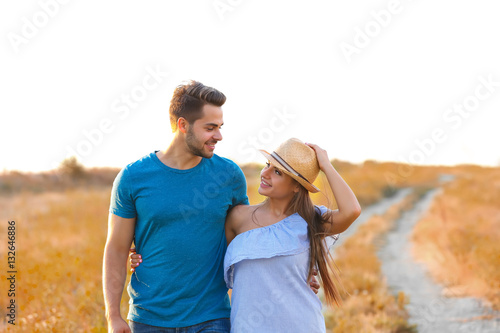 Young happy couple walking ...