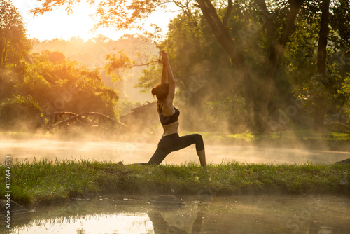 Beautiful Yoga woman in the morning at the hot spring park, soft and select focus © freebird7977