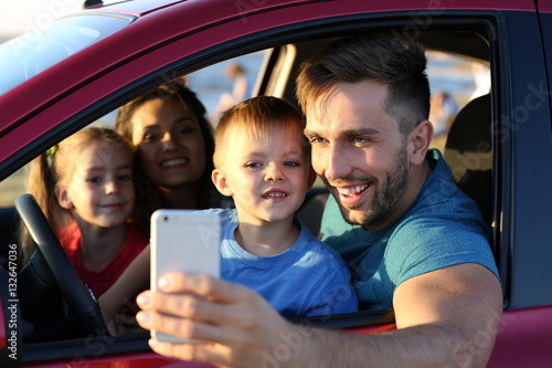 Parents with kids taking ph...