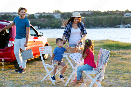 Happy family on picnic outd...