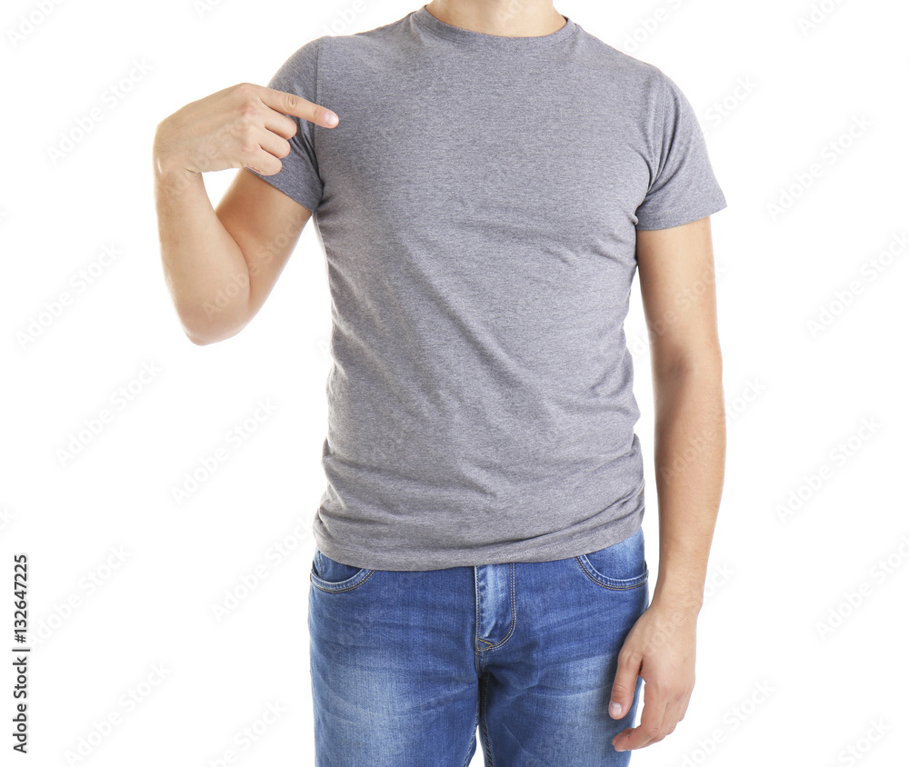 Handsome young man in blank grey t-shirt on white background, close up Handsome young man in blank grey t-shirt on white background, close up