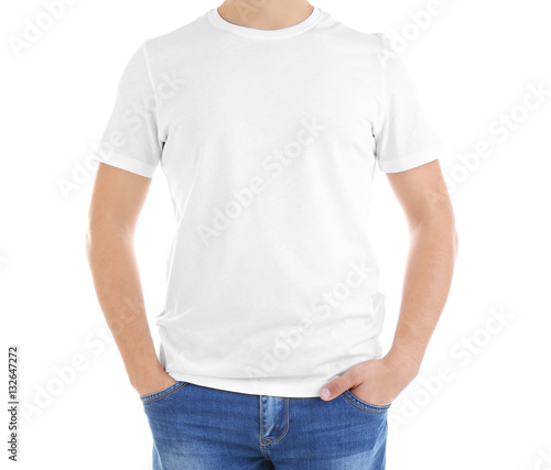 Handsome young man in blank t-shirt on white background, close up