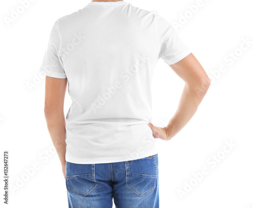 Handsome young man in blank t-shirt on white background, close up