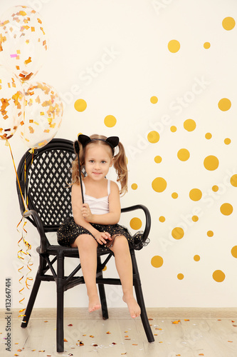 Little cute girl with party...