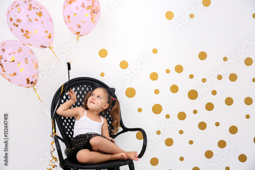 Little cute girl with party...