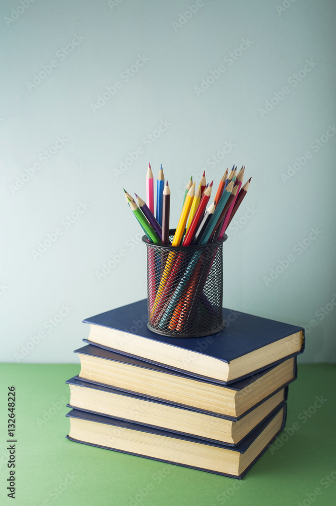 books and pencils books and pencils