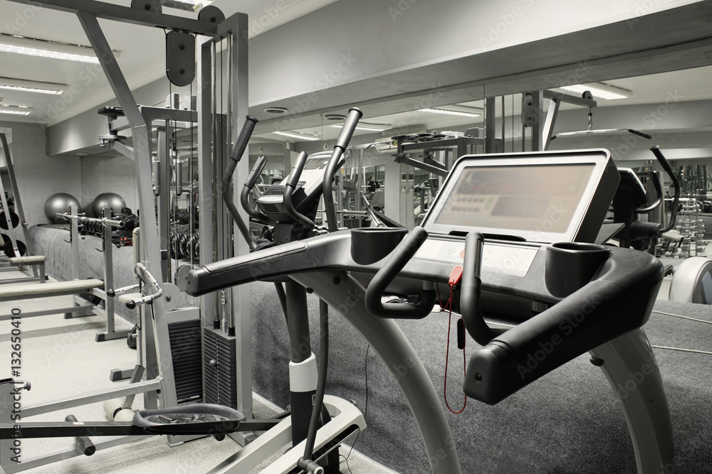 Treadmill in gym interior