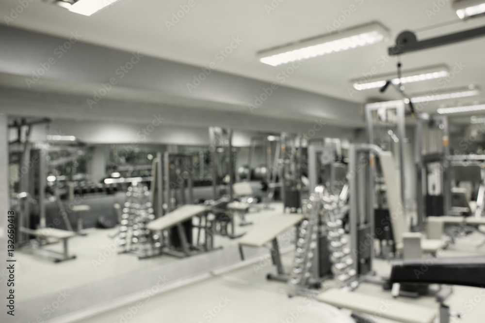 Gym interior with equipment, blurred