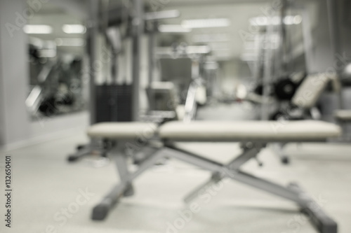 Gym interior with equipment, blurred background