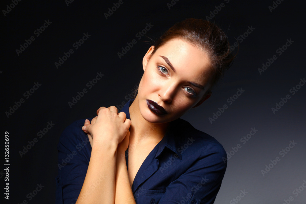 Portrait of beautiful young woman face. Isolated on black background Portrait of beautiful young woman face. Isolated on black background