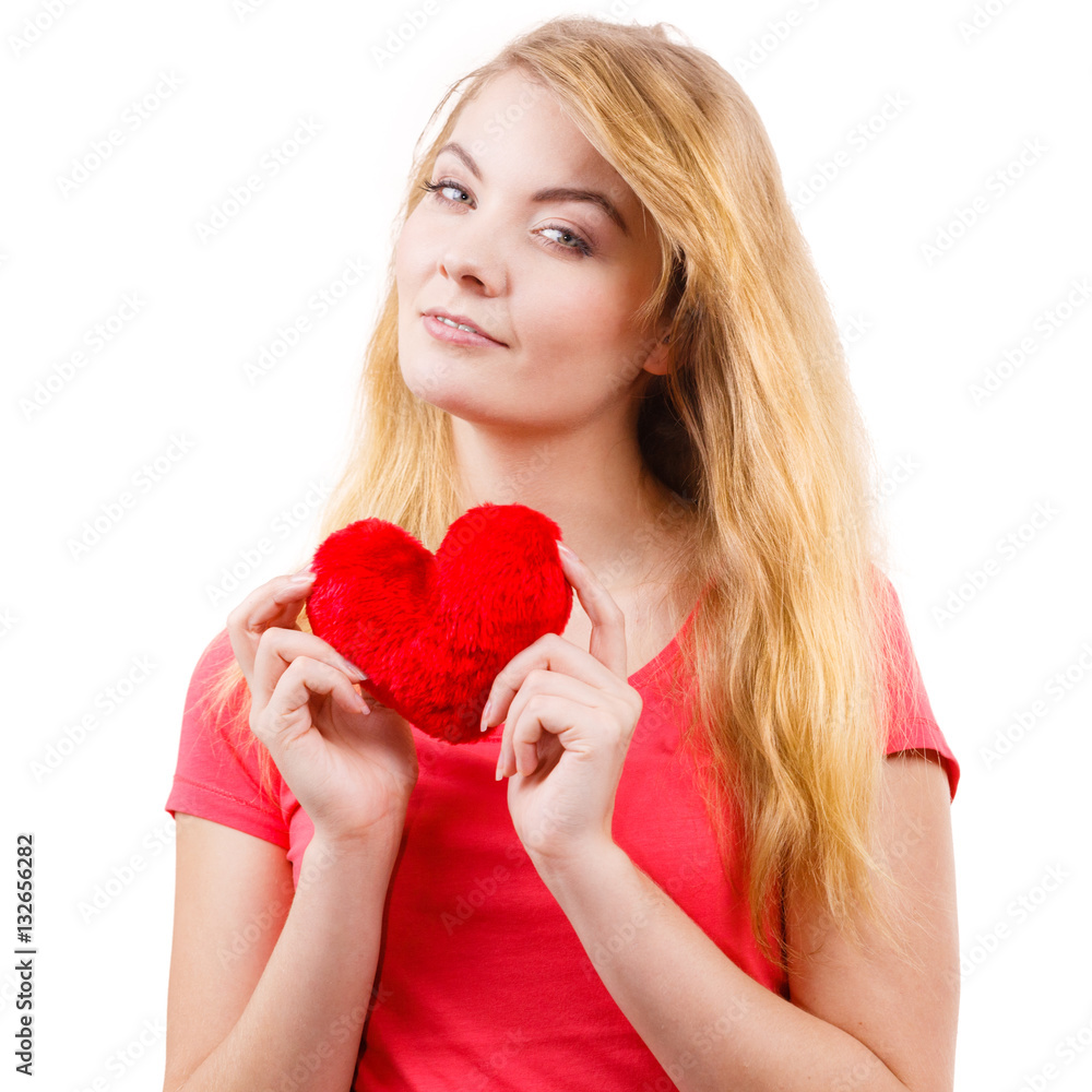 Woman blonde girl holding red heart love symbol Woman blonde girl holding red heart love symbol
