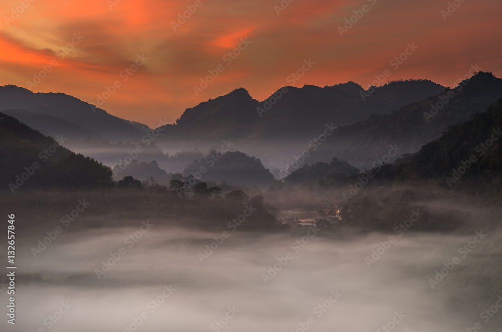 beautiful scenary of mist with mountain range at Tea plantation