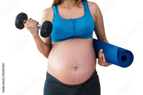 Closeup asian Pregnant female do exercise in sports room, liftin photo