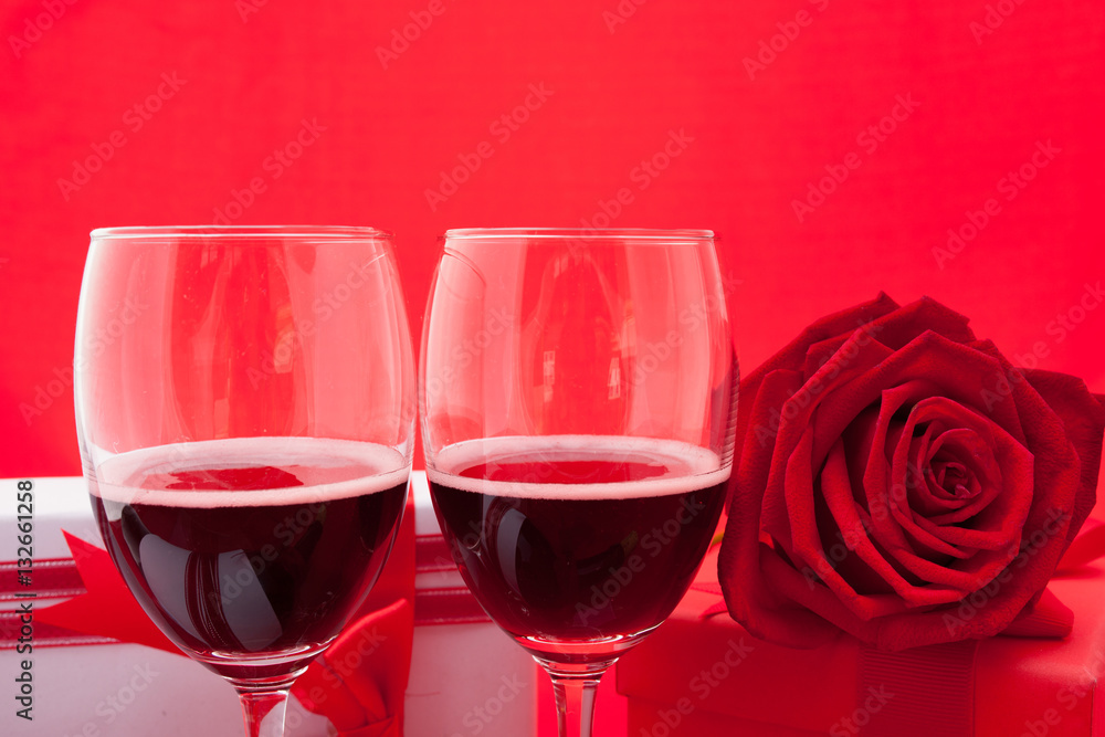 St Valentine's setting with present and red wine