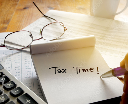 Time for Taxes reminder of doing Tax Returns. Money Financial Accounting Taxation Concept