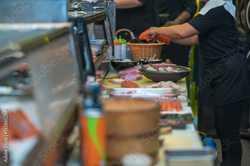 Photography Chef making sushi , Asian chef with sushi.