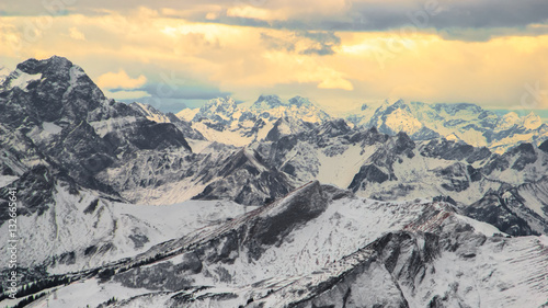 Panoramic view of the snow-capped Alps. Germany © evbuh15