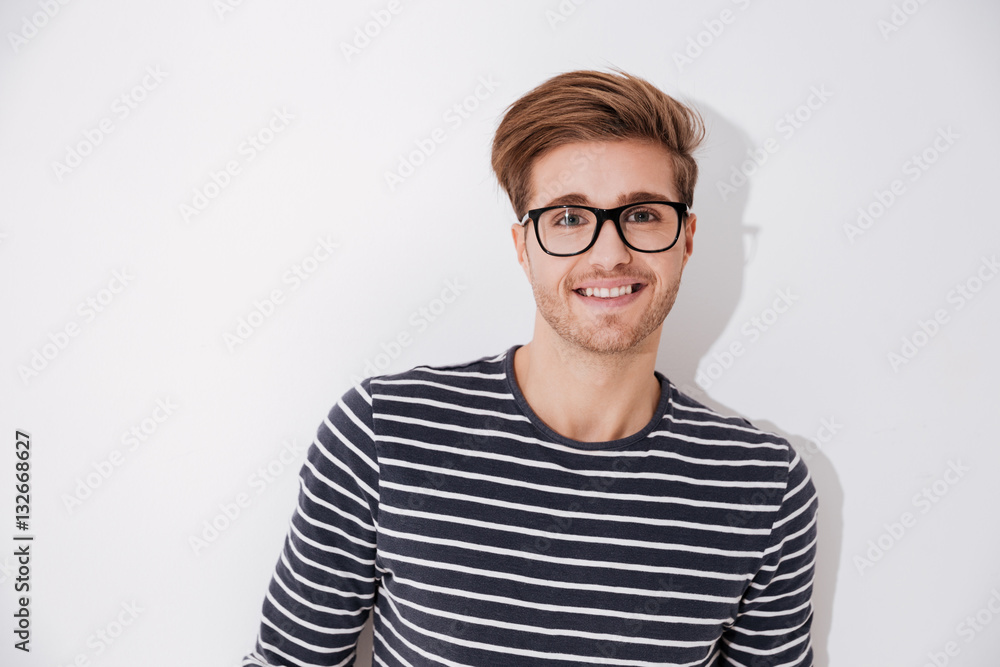 Smiling man in striped sweater Smiling man in striped sweater