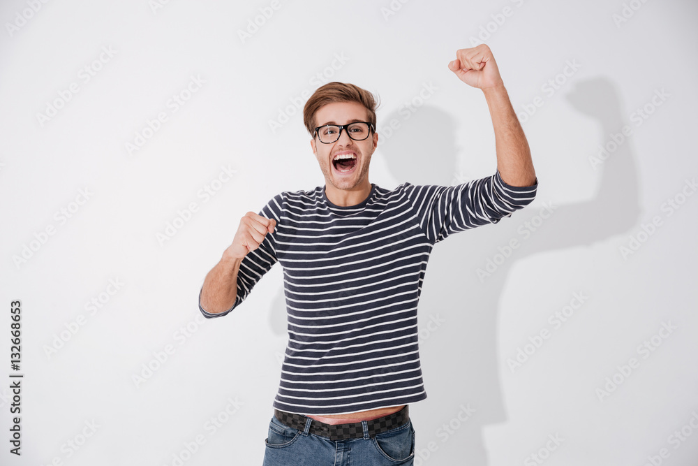 Naklejka premium Screaming man in striped sweater