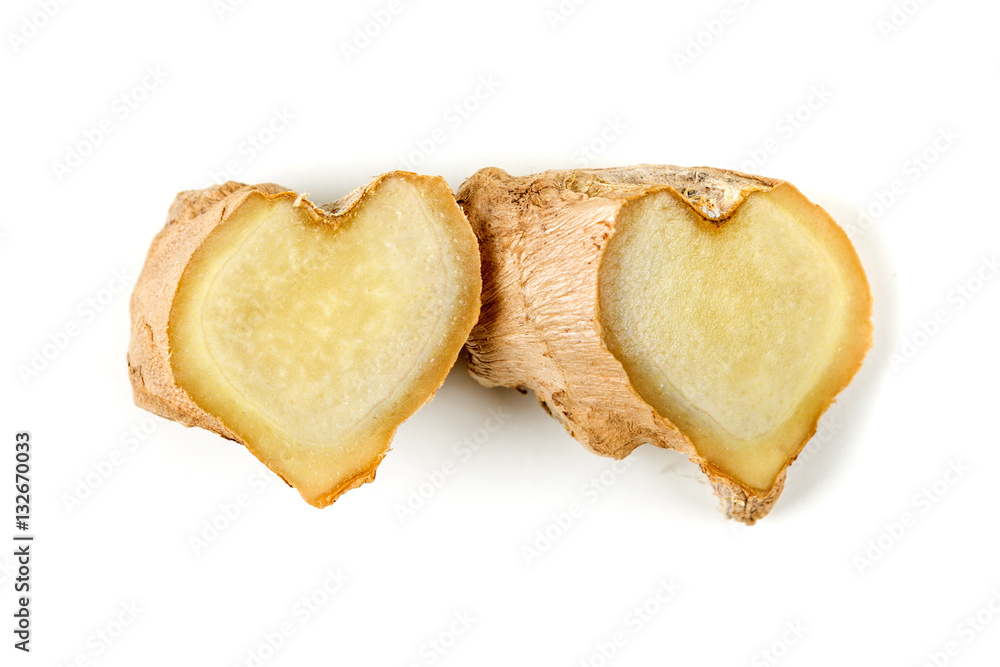Sliced ginger root with a heart shape isolated on a white background Sliced ginger root with a heart shape isolated on a white background