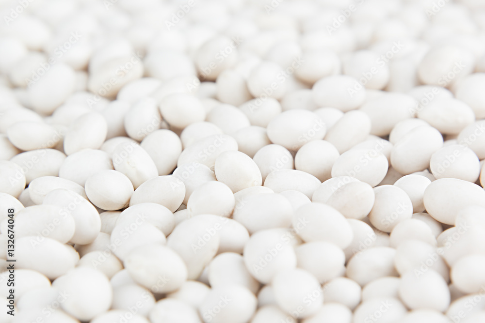 White kidney beans macro background. Healthy protein food. White kidney beans macro background. Healthy protein food.