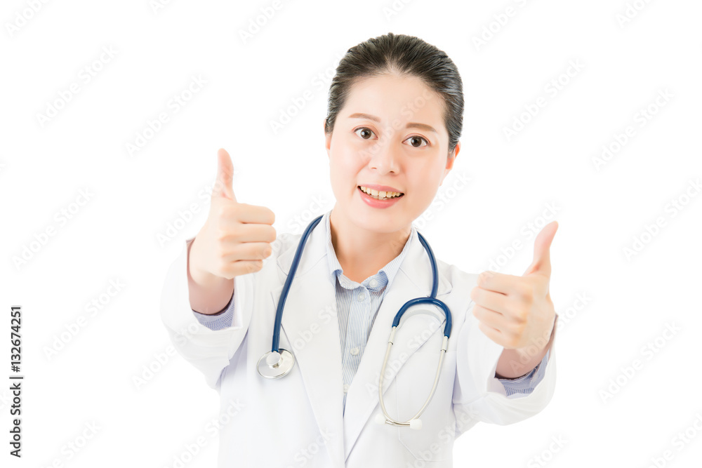 Smiling asian doctor woman with stethoscope show thumb up Smiling asian doctor woman with stethoscope show thumb up