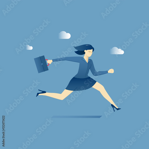 Business woman hurries with a briefcase