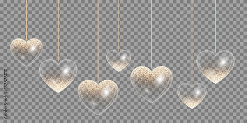 Hearts with sparkling golden reflections on a transparent background for wedding design

