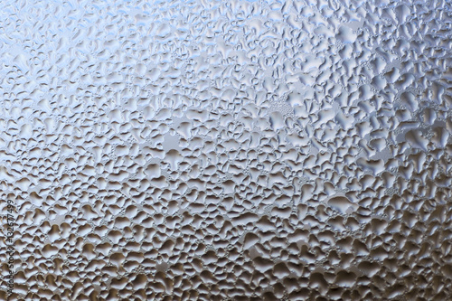 Condensation Water Drops on Window Texture Background. Dew Drop on Window Glass.