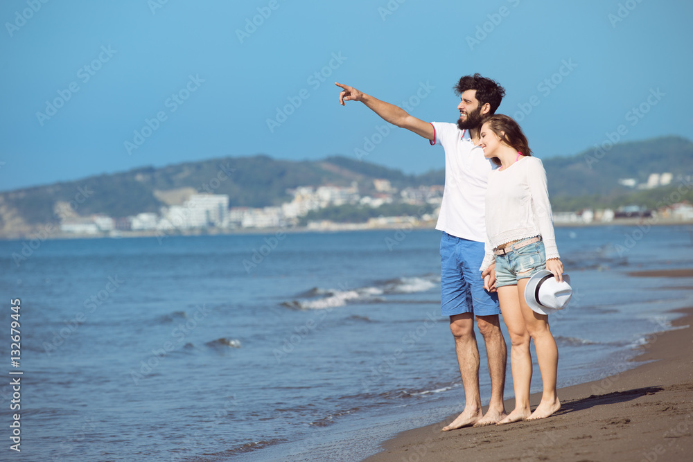 happy autumn fall couple showing with outstretched arms happy autumn fall couple showing with outstretched arms
