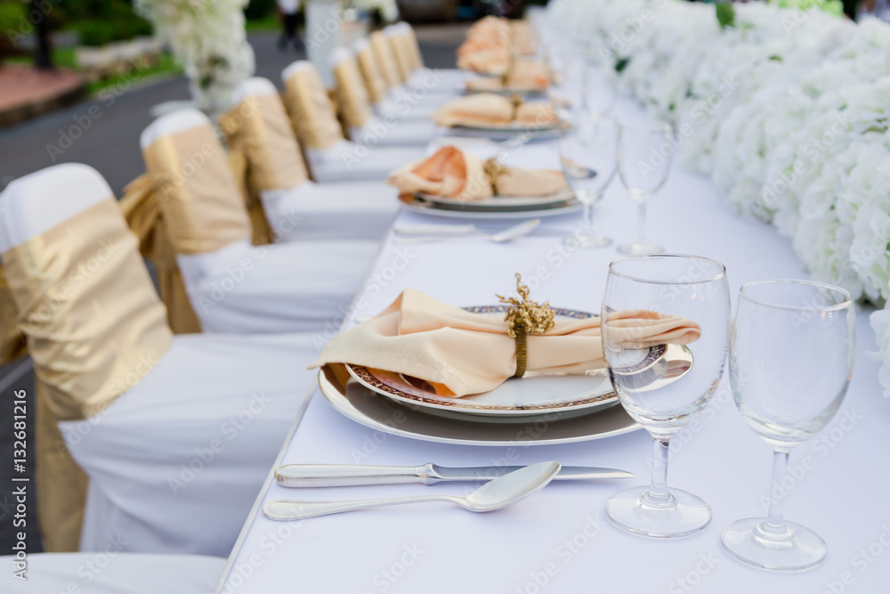 gorgeous wedding chair and table setting for fine dining at outd