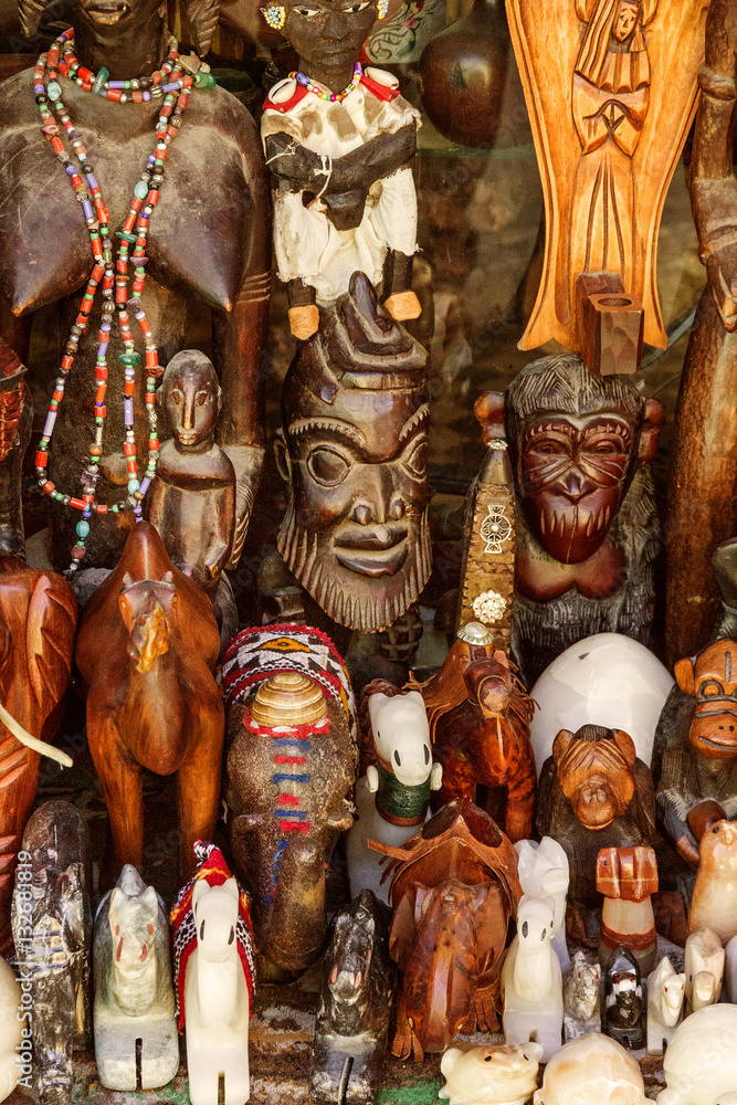 Wooden masks, African ethnic souvenirs, Morocco. Gift shop.