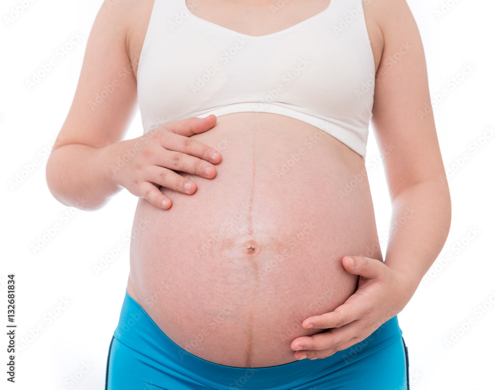 The belly asia pregnant woman isolate on white background The belly asia pregnant woman isolate on white background