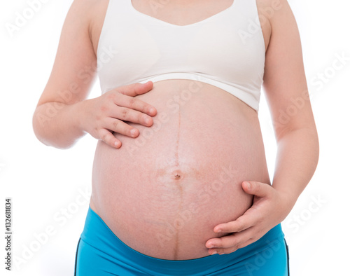 The belly asia pregnant woman isolate on white background © bunwit